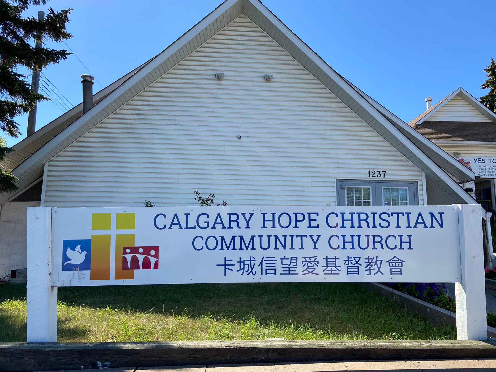 Wooden cross next to the Bible Wooden cross next to the Bible